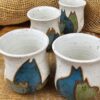 CONJUNTO DE 4 COPOS AMASSADOS - CAFÉ<br /> Gangue<br>Azul, verde e branco
